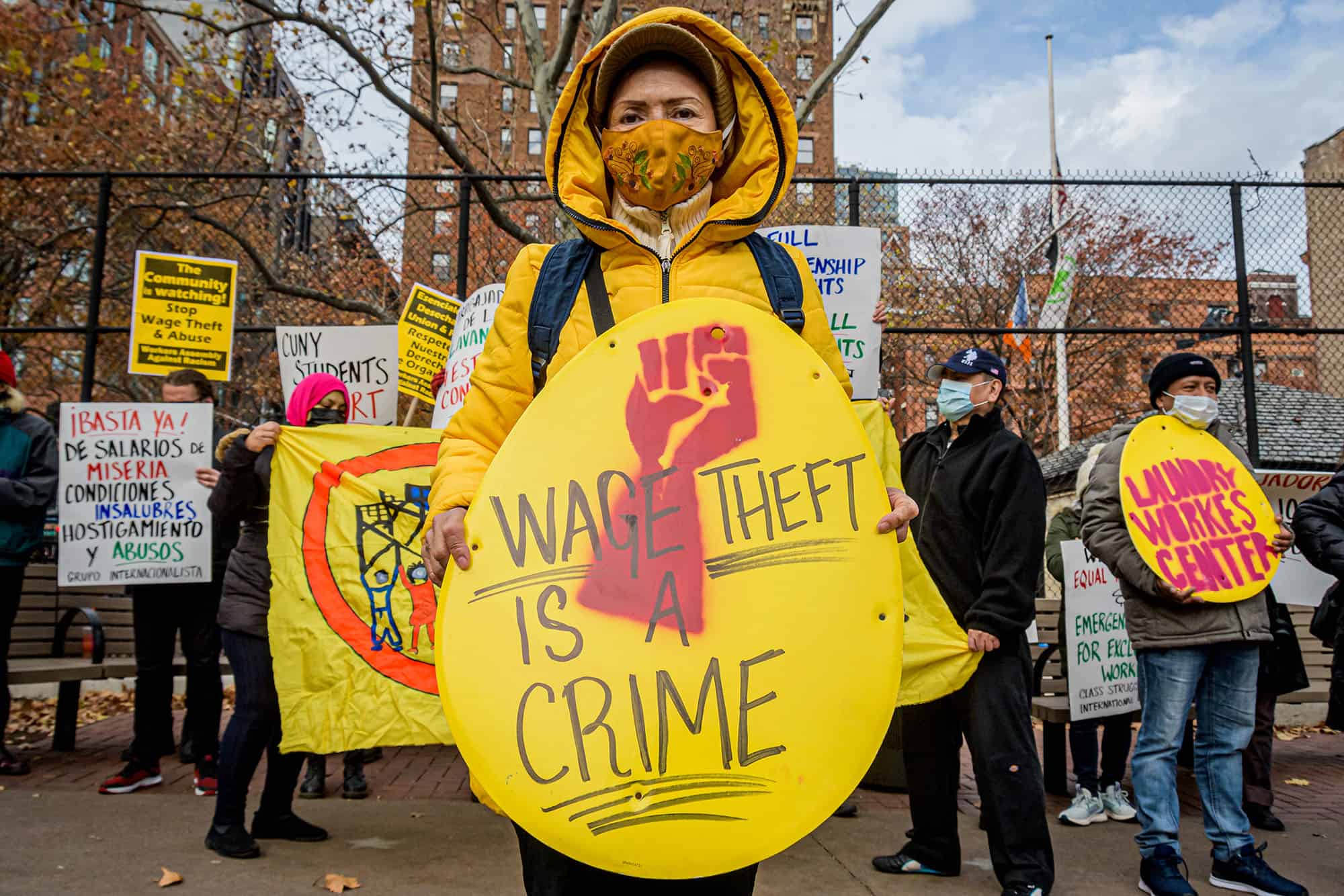 Laundromat workers rally in New York, alleging abuses of labor law.