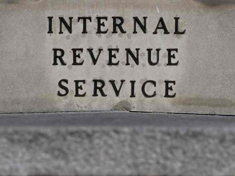 An up-close photo of the Internal Revenue Service sign on the headquarters.